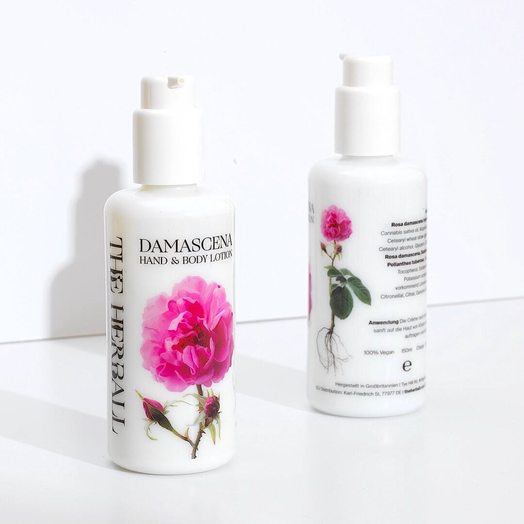 Two bottles of damascena hand and body lotion