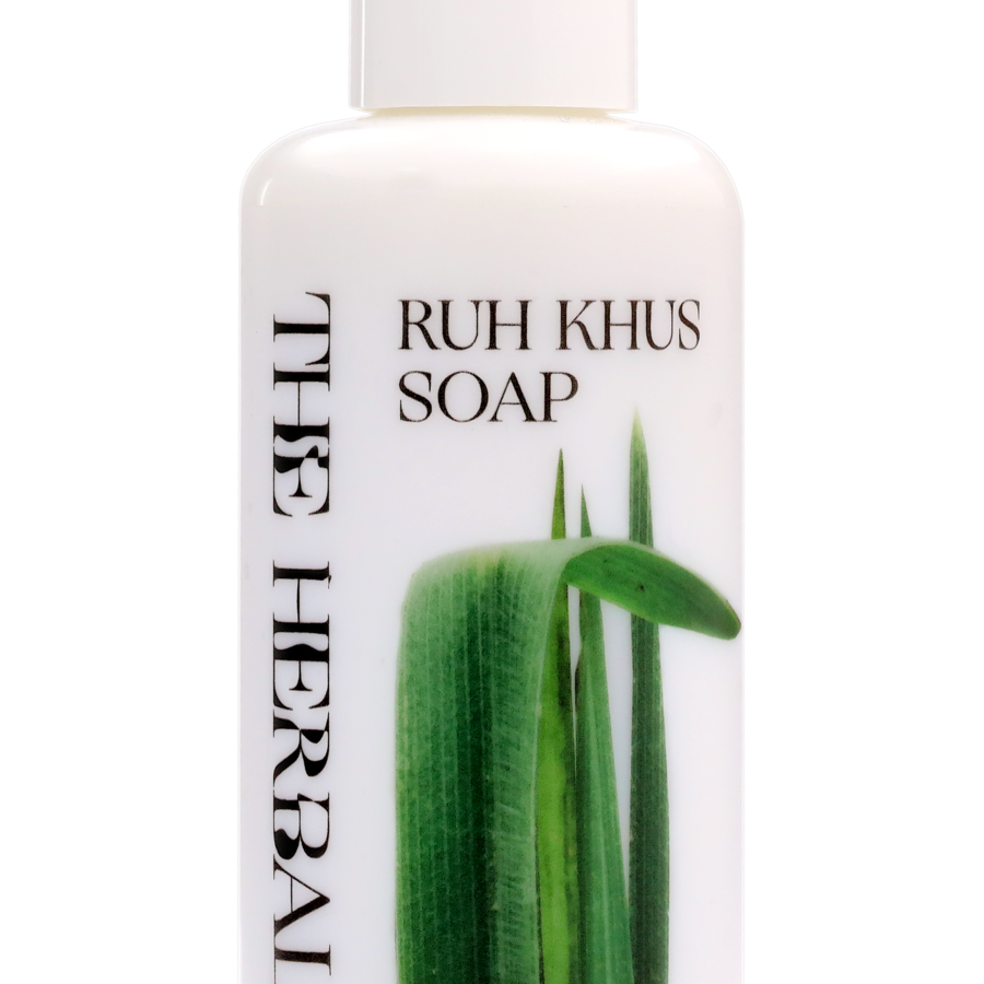 A white bottle with pump and a label showing Ruh Khus Soap and the Herball logo.